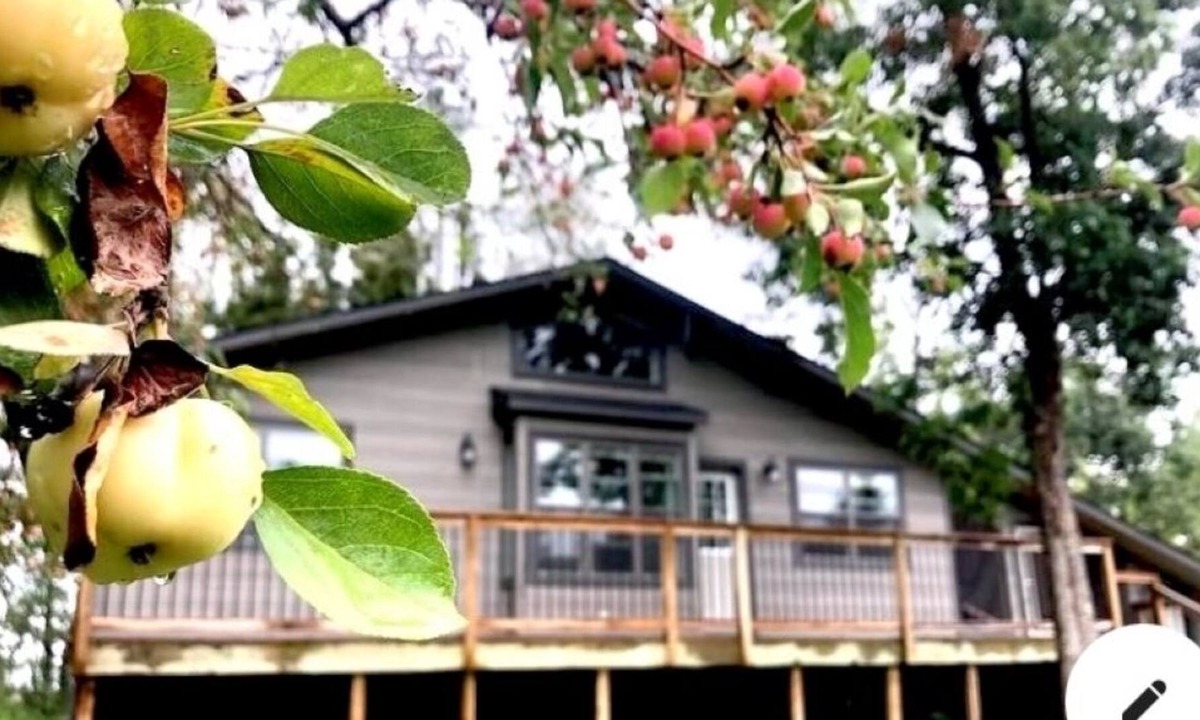 Onanole Other | Quiet, serene accommodation with fire pit, lake view, screened-in sitting area.