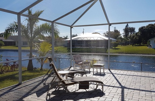 Cape Coral Villa | Southern exposure Canal Home with heated Pool - electric or solar !