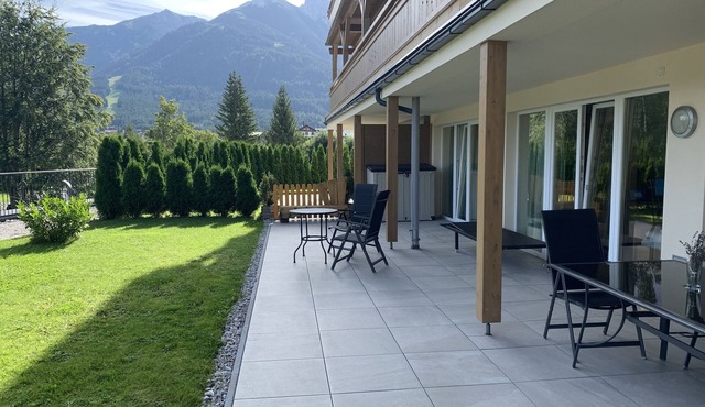 Modern luxury 2 bedroom ground floor apartment with outside terrace and garden in Seefeld
