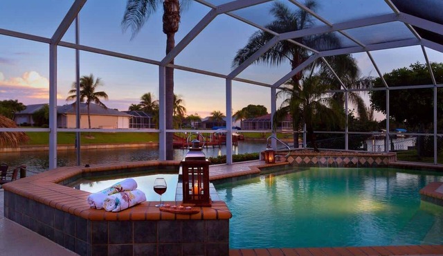Pretty Waterfront Home w/Heated Pool/Spa + Tiki in Cape Coral