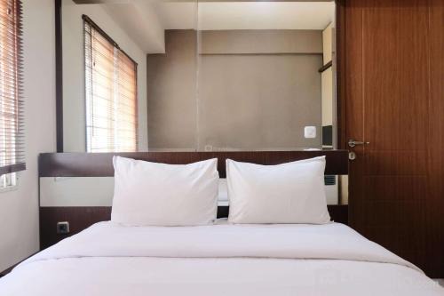 Spacious 3BR Combined Unit at Pinewood Apartment By Travelio in Sumedang