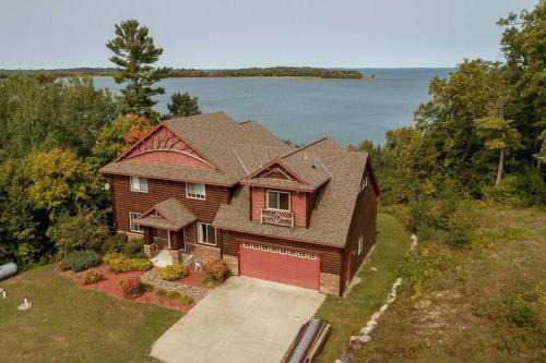 Spacious Leech Lake Home on 2 Private Acres, 200' of lake shore 15 Minutes to Walker with boat lift, dock, swimming, fire pit in Walker