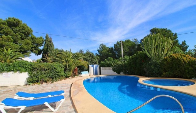 Villa Robert. Smart detached Villa with communal pool and fully fenced garden in Calpe