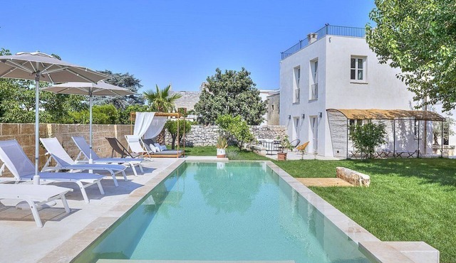Villa Tindaro: A modern and graceful two-story villa with the fascination of the typical courtyard houses of Salento area, with Free WI-FI. in Surano